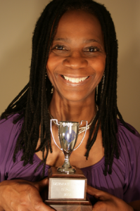 Adult student with the Silver Senior Cup for 3 years of consecutive Superior Grades.